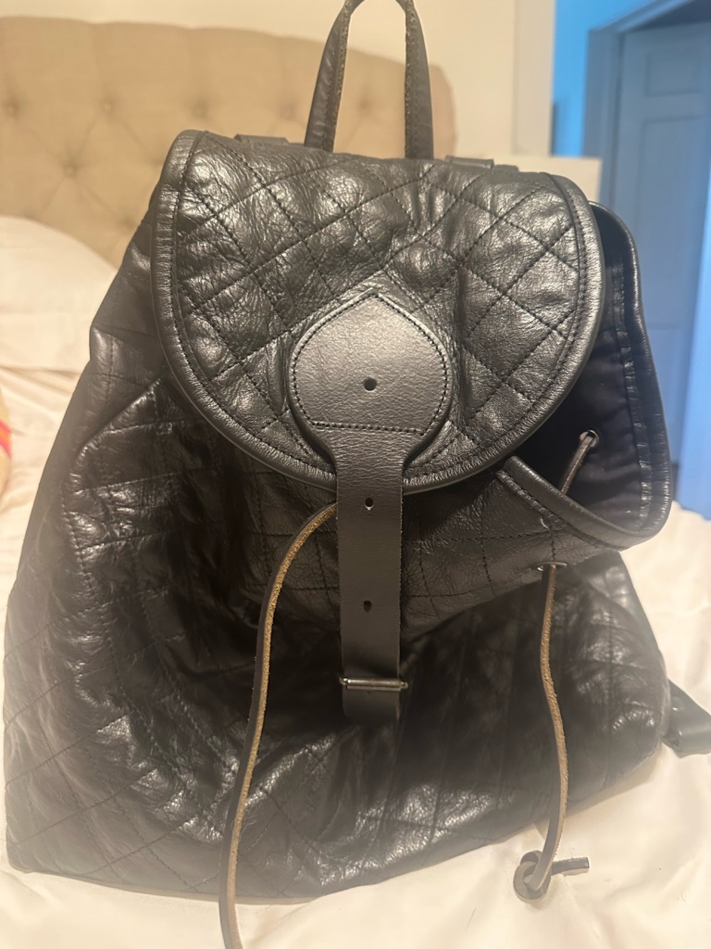 Quilted Black Leather Drawstring Backpack